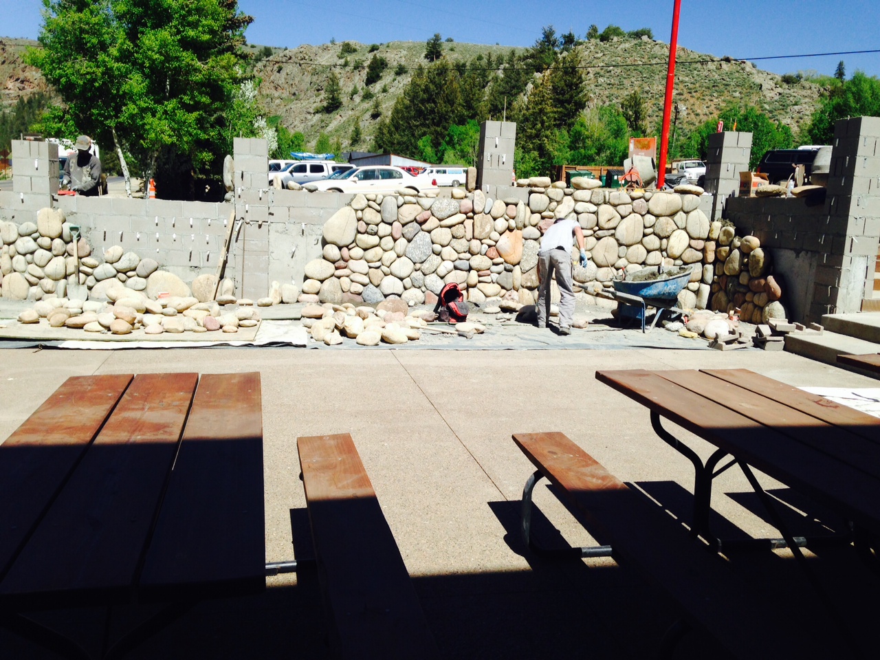 Building the rock wall around the patio